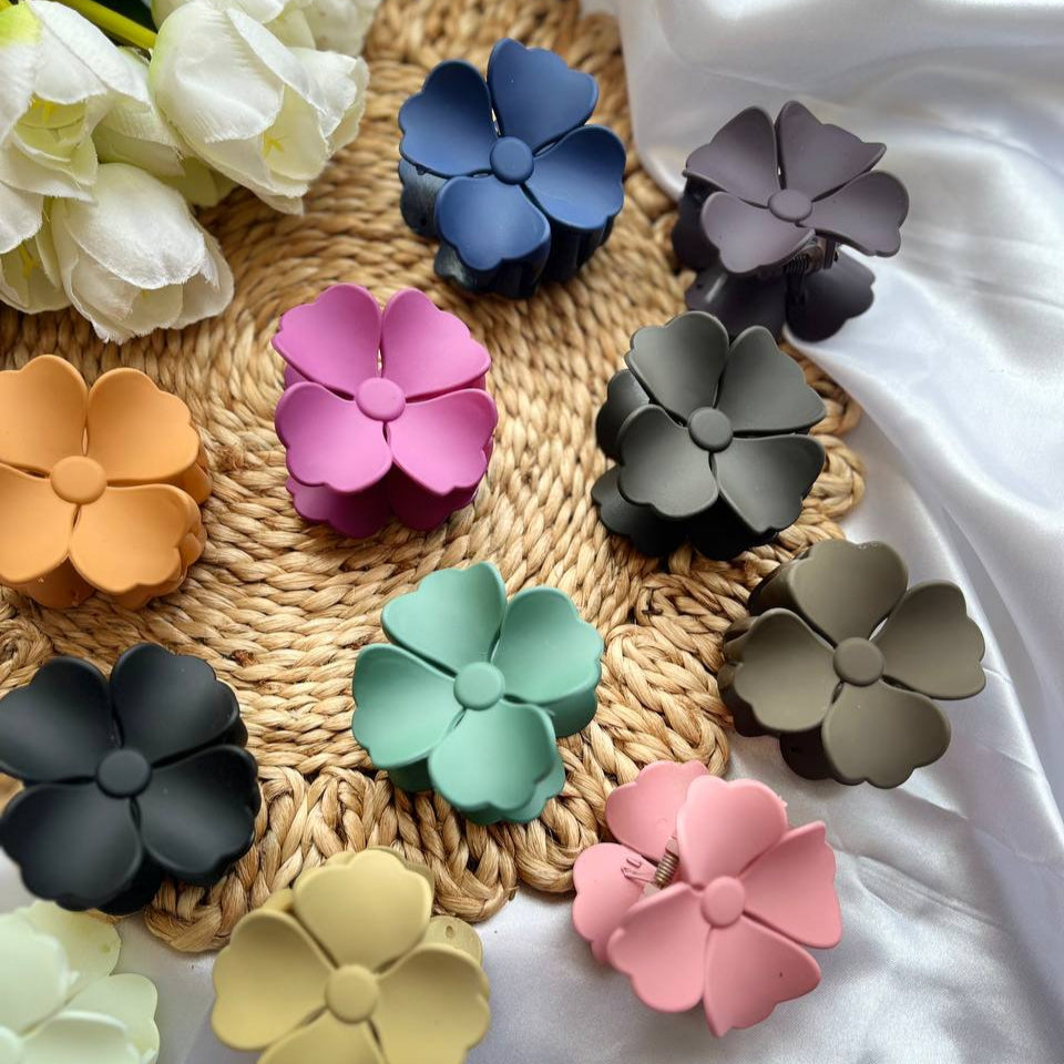 Tivra Blossom Grip Claws Colorful flower-shaped clips on a textured surface #IndianAccessoryBrand
#EverydayAccessories #tivra #tivracreation
#ElegantHairClips
#HairClipGoals
#TrendyHairClaws
#WhiteClawClip
#StyleWithTivra
#AccessoryOfTheDay
#InstaHairStyle
#HairStyleAccessories
#AestheticClips
#OOTDIndia