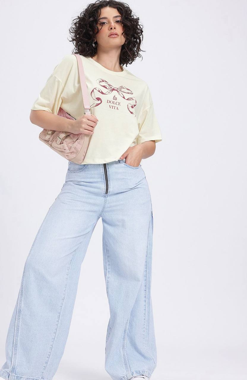 Printed Drop-Shoulder Sleeves T-shirt #OversizedTshirt #tivra #tivracreation
#GraphicTshirt #bow #tshirt
#StreetStyle
#CasualLook
#OOTD
#StreetwearFashion
#TrendyOutfits
#MinimalStyle
#CottonWear
#StyleInspo