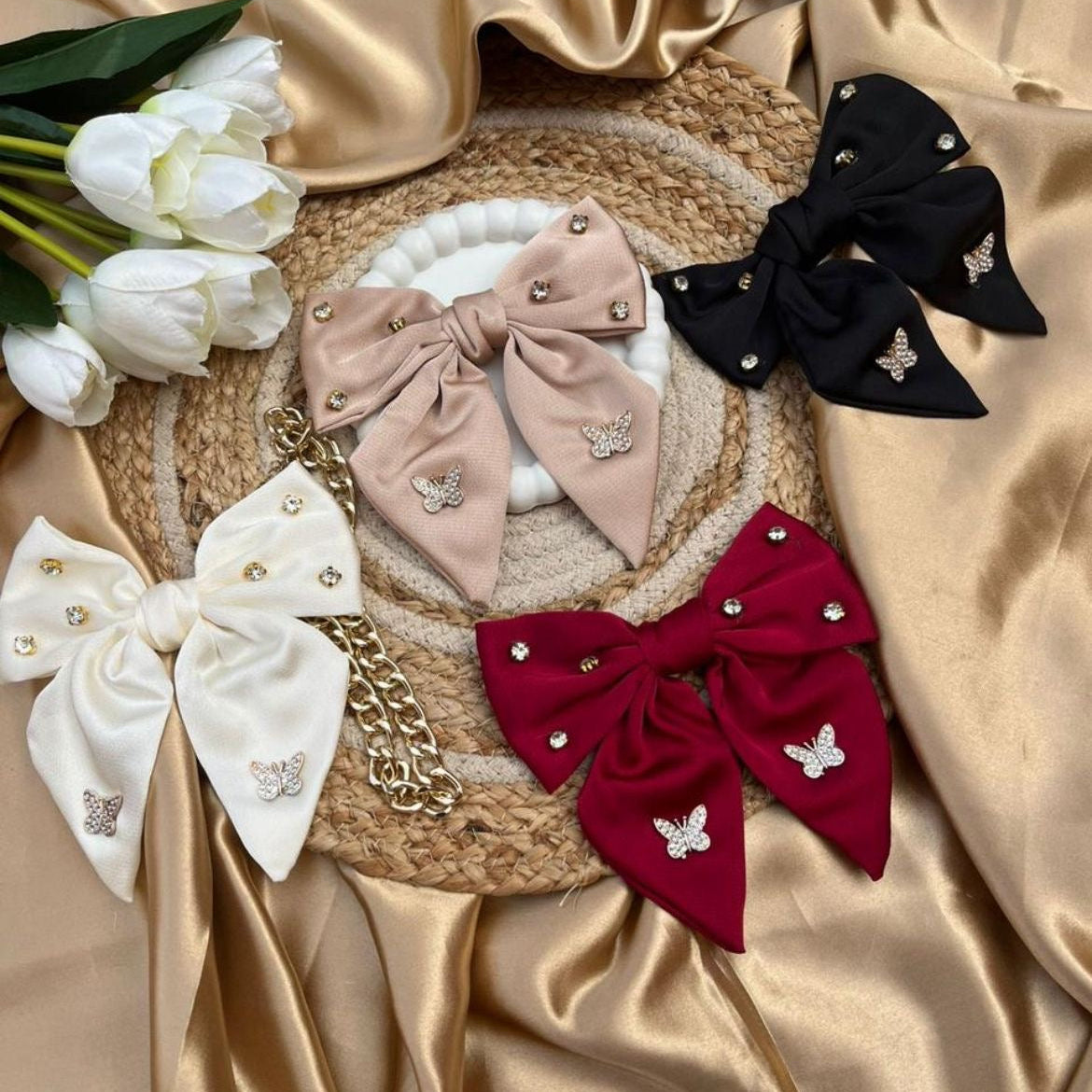 Decorative headband with colorful bows on a satin surface #GoldenCharmBow #tivra #tivracreation
#BowHairClips
#SatinBowClip
#ElegantHairAccessories
#CuteHairClips
#HairAccessoriesIndia
#GoldenHairClip
#TrendyHairAccessories
#AestheticHairClips
#GirlsHairAccessories
#ChicBowClip
#PartyHairAccessories
#LuxuryHairClips
#FashionHairClips
#HairClipLove
#OnlineShoppingIndia
#HairClipsForGirls
#SatinAccessories
#BowClipStyle
#ClipYourLook