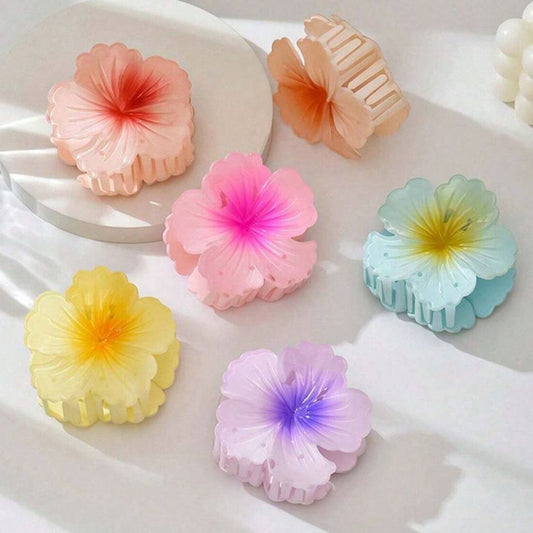 Colorful flower-shaped hair clips on a white surface #HairClipsTrend #HairClawAddict #HairGameStrong #HairInspo #HairGoals #TrendyHairAccessories #HairClipStyle #ClawClipStyle #ClawClipTrend #EverydayHairStyle #ShopTivraCreation #ShopIndia #AmazonFinds #FlipkartFinds #ShopifyFinds #TrendingOnTikTok #ViralHairClip #YouTubeFashion #InstaFashionFinds #MadeInIndiaWithLove #AffordableHairAccessories #HairClipsOnline #GlowHairClaw #PearlFinishClaw #CuteHairClaw