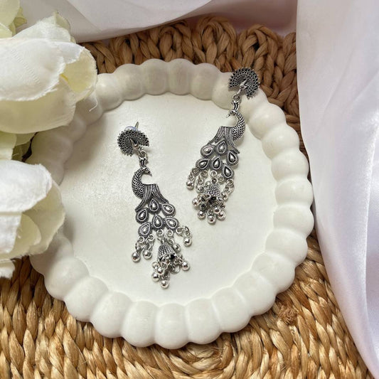 JUNO Peacock Earrings #tivra #tivracreation #peacockearrings  
#peacockjewellery  
#peacockjewelry  
#earrings  
#womenjewellery  
#statementearrings  
#ethnicjewellery  
#indianjewellery  
#jhumka  
#jhumkas  
#earringsoftheday  
#jewellerylover  
#beautifulearrings  #peacockdesign  
#peacockinspired  
#peacockfashion  
#traditionalearrings  
#festivejewellery  
#bridaljewellery  
#oxidisedearrings  
#mattejhumkas  
#jewellerybrand  
#onlinestoreindia  