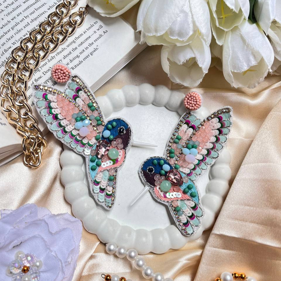 Tivra Creation Fairy Kingfisher Birds Handmade Beaded Earrings #FairyKingfisherEarrings

#BirdInspiredJewelry

#StatementEarrings

#ButterflyEarrings (for visual similarity)

#WhimsicalAccessories

#HandmadeBirdEarrings

#BeadedBirdEarrings

#PastelJewelry #tivra #tivracreation
