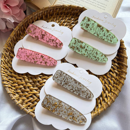 Set of colorful hair clips on white cards with 'Jewelry' branding, displayed on a woven tray. Tivra Creation Glitter Acrylic Hairclips #GlitterAcrylicHairclips
#GlitterHairClips
#AcrylicHairClips
#GlitterAccessories
#SparkleHairClips
#ShinyHairClips
#TrendyHairClips
#TivraCreation
#TrendingNow
#MustHave
#ViralAccessories
#StyleInspo
#OOTD
#AccessoryTrend
#GlitterAcrylicHairclips
#TivraCreation
#HairAccessories
#SparkleHairClips
#TrendyHairClips
#TrendingNow
#OnlineSeller
#ShopifyStore
#FlipkartFinds
#Amazon